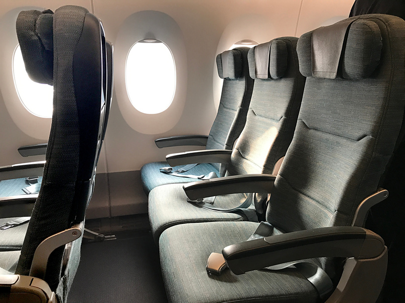 Empty airplane seats in an airplane
